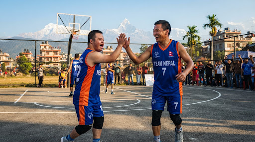 Two unified partners on a football pitch